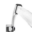 Chrome shower head with water stream.