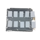 Gray organizer with white squares in plastic wrap.