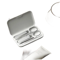 Open manicure set in a white case.