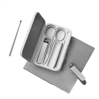 Silver manicure set in a white case.