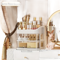 White three-layer makeup organizer.