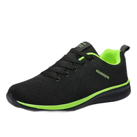 Black and green running shoe.