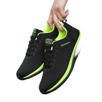 Black and neon green running shoes.