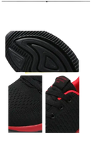 Black and red athletic shoe.