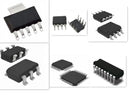 Assorted integrated circuit chips.